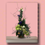 Floral arrangement on a wooden shelf with a pink background