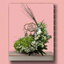 Floral arrangement on a pink background with decorative elements