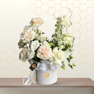 Anselma sleeveless floral midi dress with a side slit and elegant silhouette, shown in a studio product shot. Main image