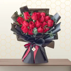 red roses bouquet in black wrapping Main image