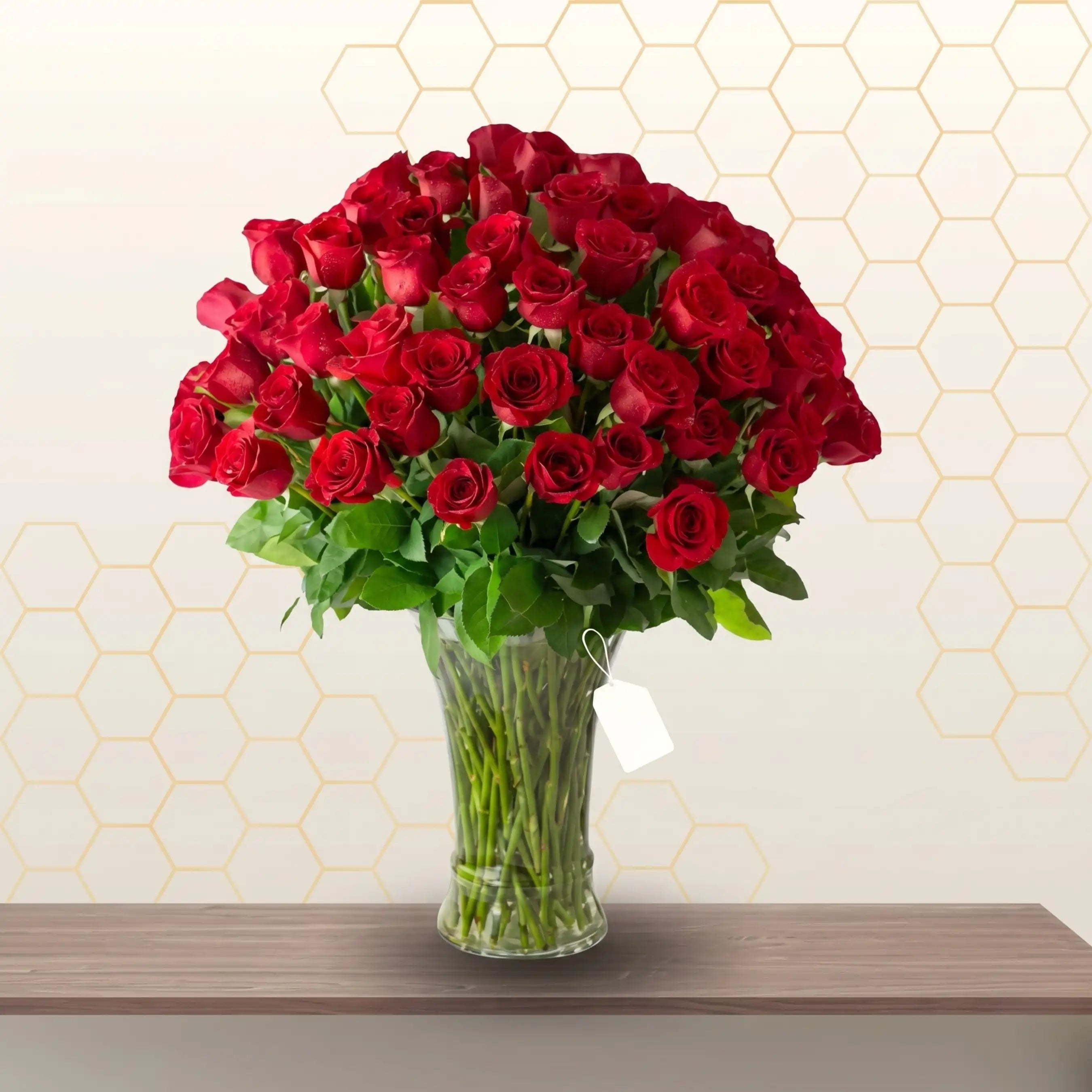 JULES - RED ROSES IN GLASS VASE