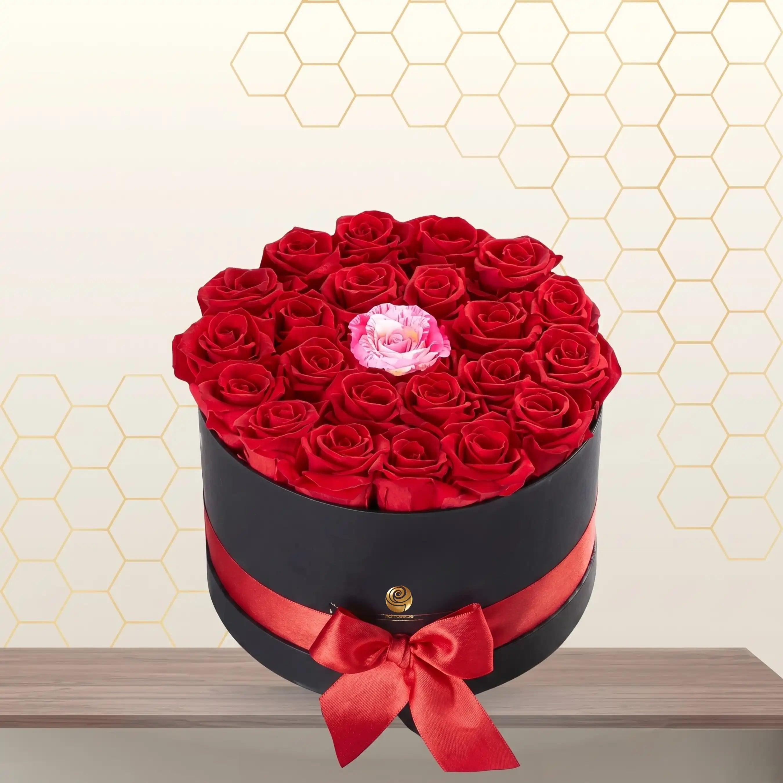 red roses and pink rose in round box Main image