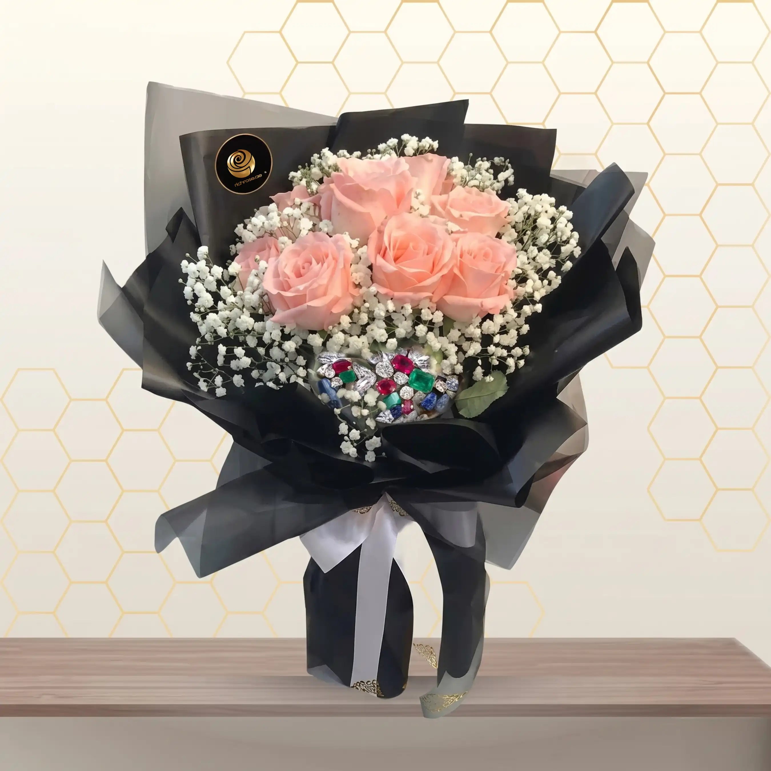 peach-roses-black-wrapped-bouquet (2).webp