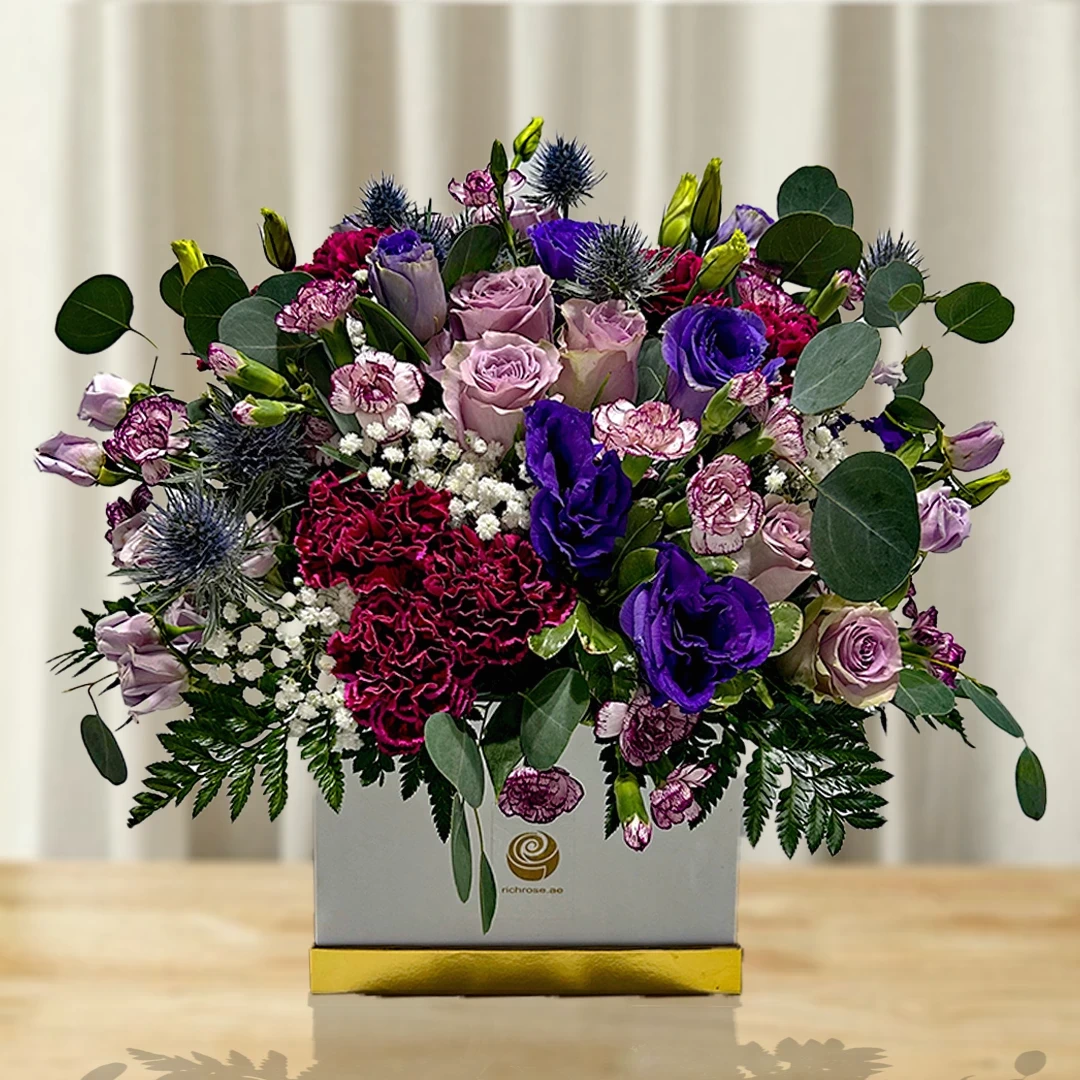 Mixed Purple Flowers in White Square Box