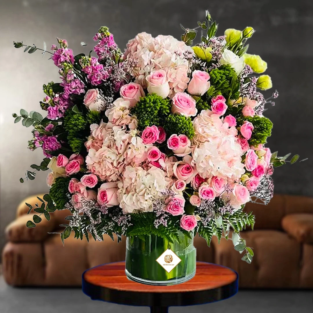 Premium Exotic Pink Flowers in Vase