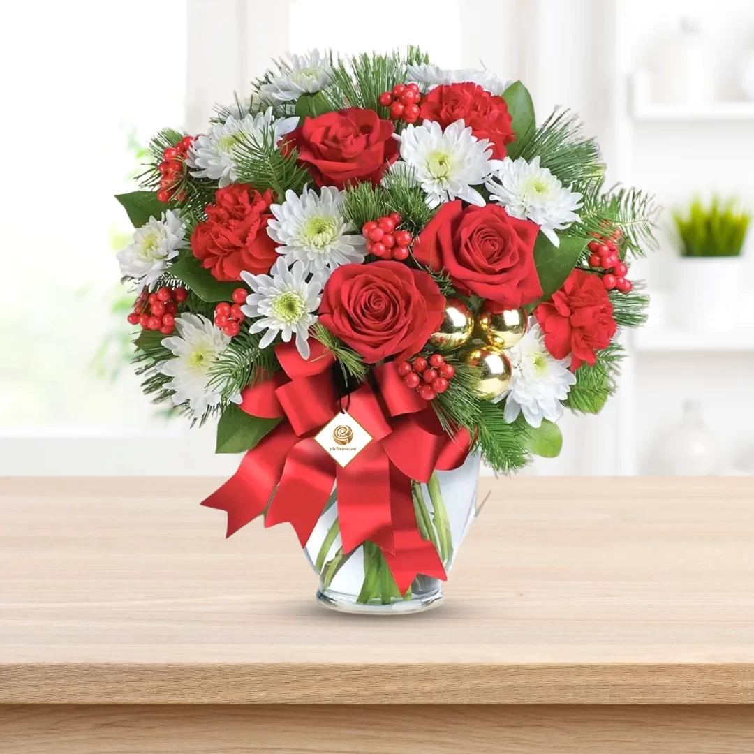 Christmas Flowers in Glass Vase