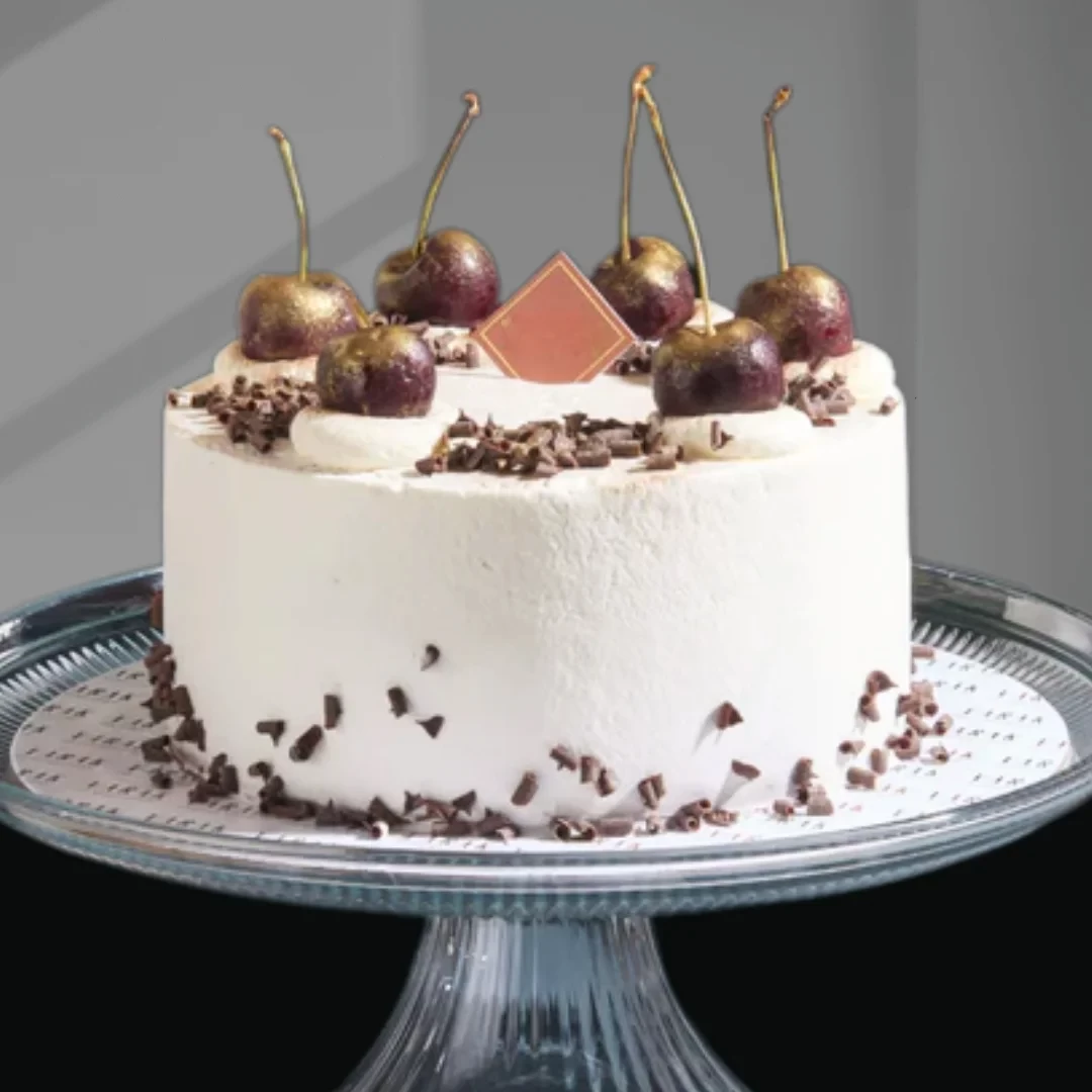 BLACK FOREST - Tall tiers of chocolate sponge