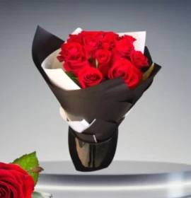 red roses bouquet in white black wrapping