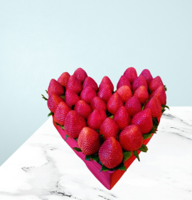 strawberry fruits in heart shape box