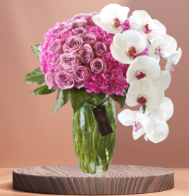 purple roses and carnation in premium vase