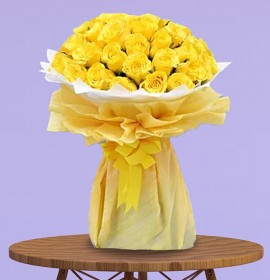 Yellow roses yellow wrapped bouquet
