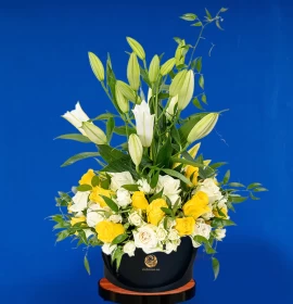 yellow and white flowers box - flower delivery dubai