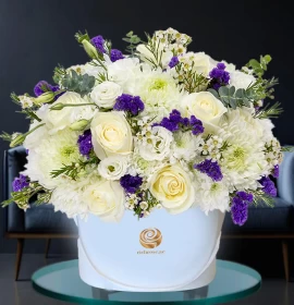 white roses and purple flowers box