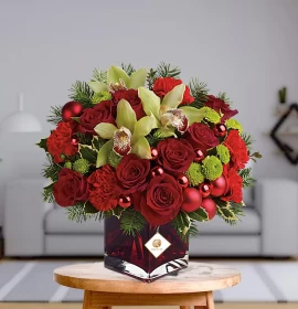Christmas Flowers in Red Square Vase