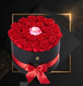 red roses and pink rose in round box