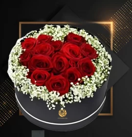Red roses heart in round box
