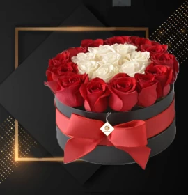 white and red roses in box