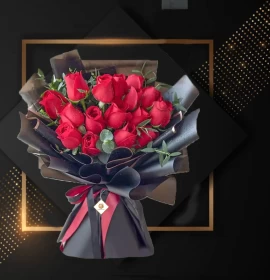 red roses bouquet in black wrapping