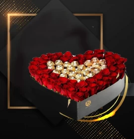 red roses and rocher ferroro in heart box