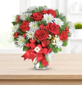 Christmas Flowers in Glass Vase